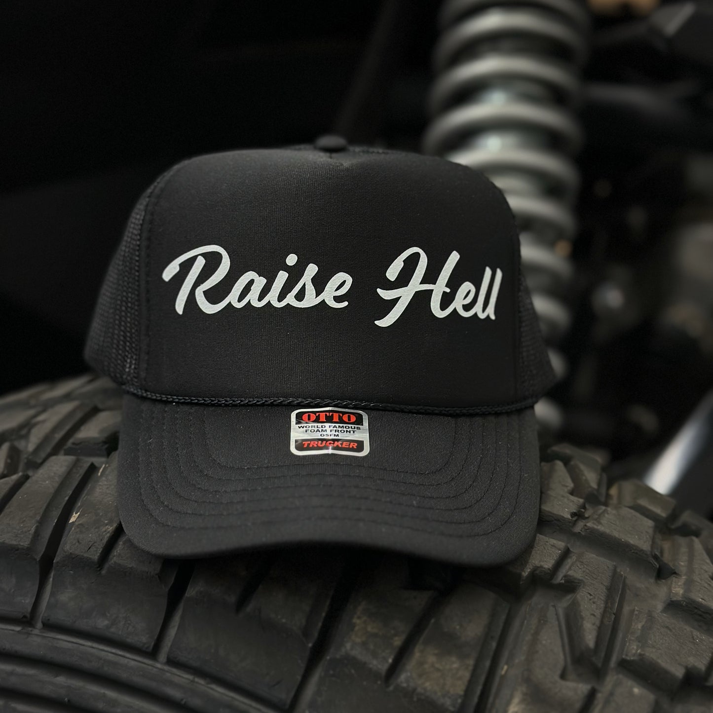 RAISE HELL TRUCKER HAT